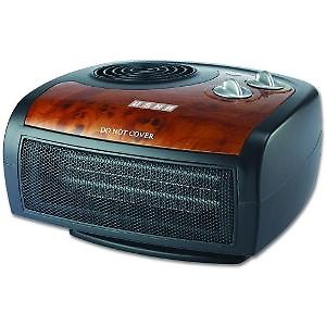 USHA FH 1212 PTC 1500-Watt with Adjustable Thermostat (Black/Brown) Fan Room Heater price in India.