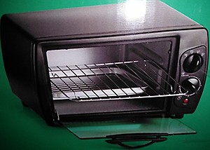 Pigeon by Stovekraft Oven Toaster Grill (12382) 20 Liters OTG Without Rotisserie, Oven Toaster and Grill for grilling and baking Cakes (Grey) price in India.